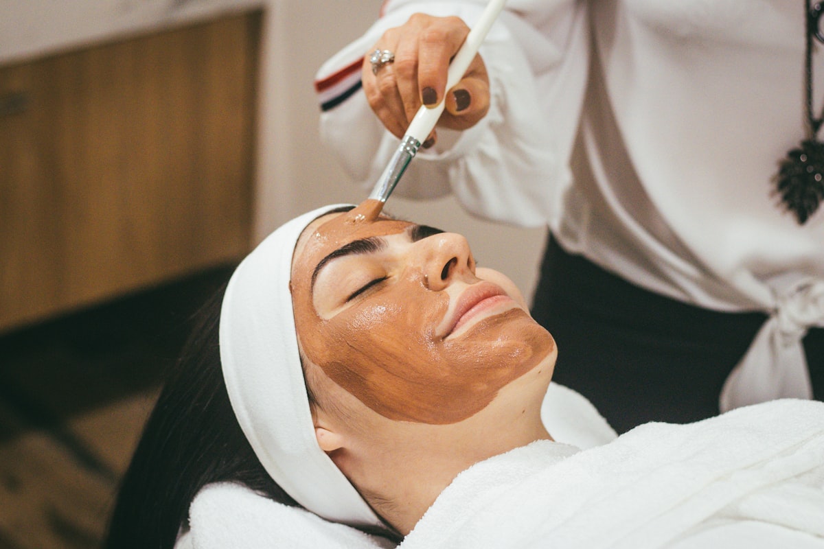 A facial treatment being applied